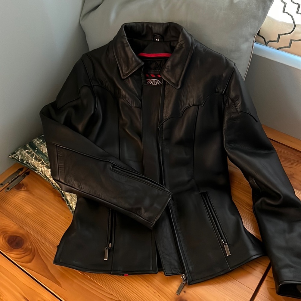 Barely worn HEAVY leather Milwaukee jacket